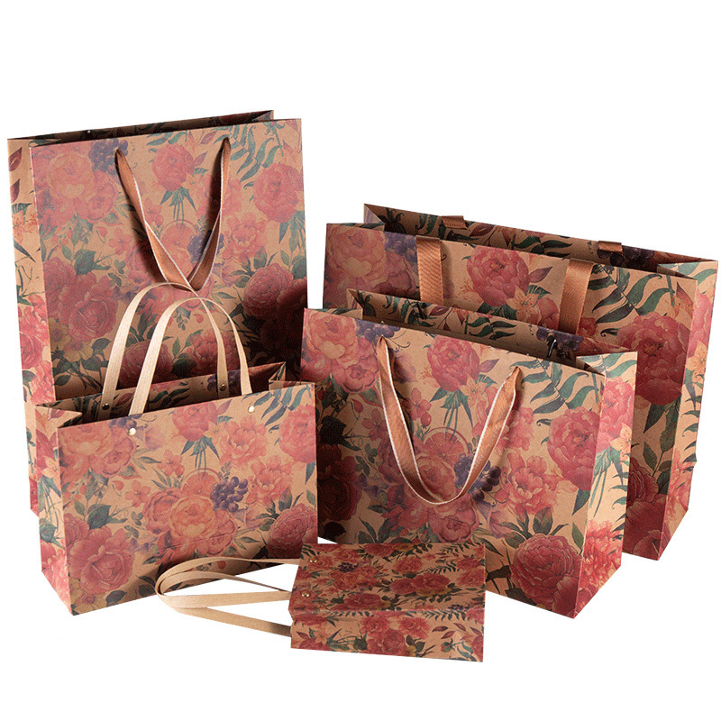 Elegant Chinese-style kraft paper gift bag with blue print; custom premium shopping bag with handles for packaging.