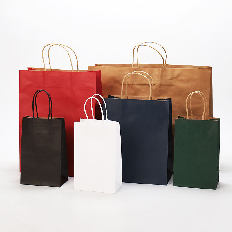 Factory-customized kraft paper bags with handles; color options available.