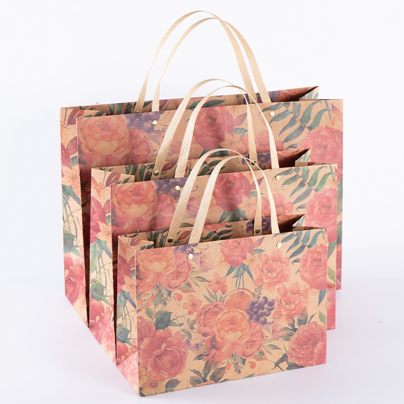 Elegant Chinese-style kraft paper gift bag with blue print; custom premium shopping bag with handles for packaging.