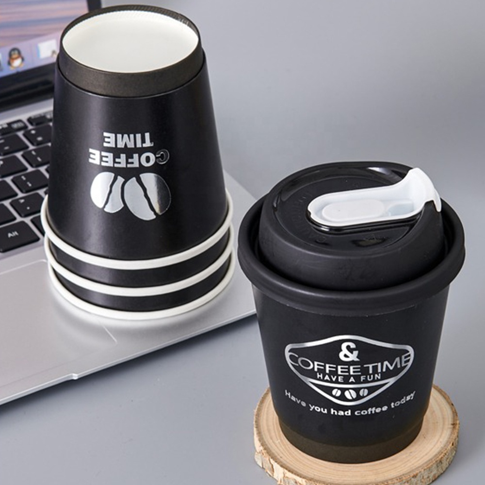Double-wall, food-grade, thick disposable paper cups—custom printed with logos—suitable for hot drinks.