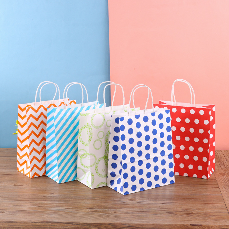 Customizable kraft paper bags featuring stripes, polka dots, or wavy patterns—suitable for shopping or gifts.
