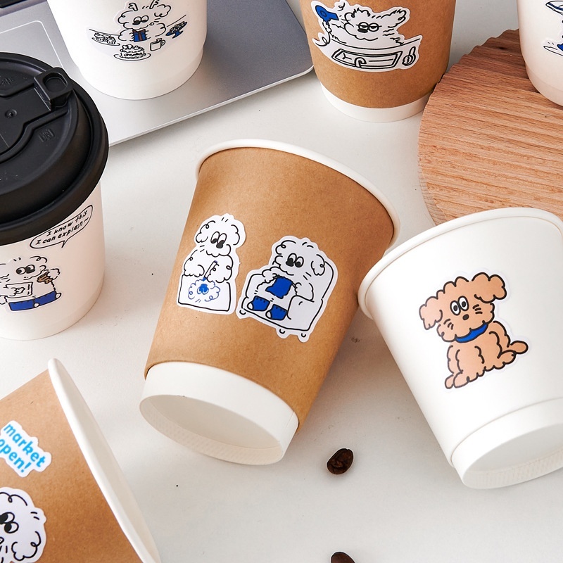 Custom-printed disposable double-wall paper cups for hot drinks—suitable for milk tea and coffee—with lids.