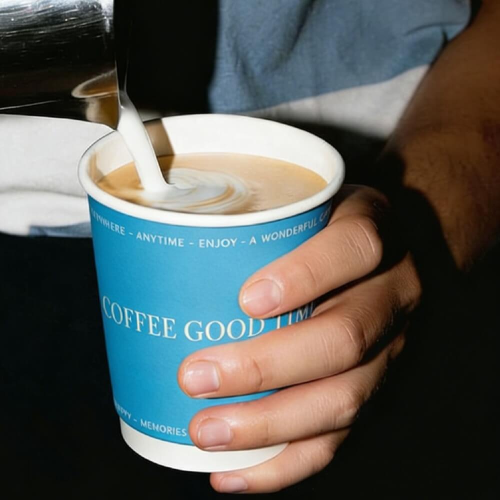 High-quality 10 oz double-wall insulated disposable paper cup for hot takeaway coffee.