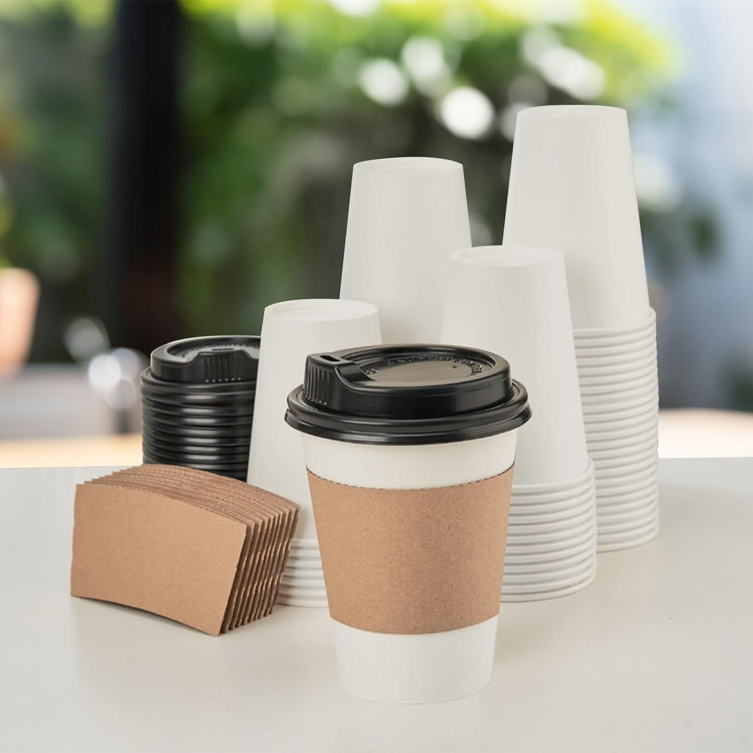 Custom-printed biodegradable disposable paper cups for food and beverage brands - perfect for camping, hot drinks, and parties.