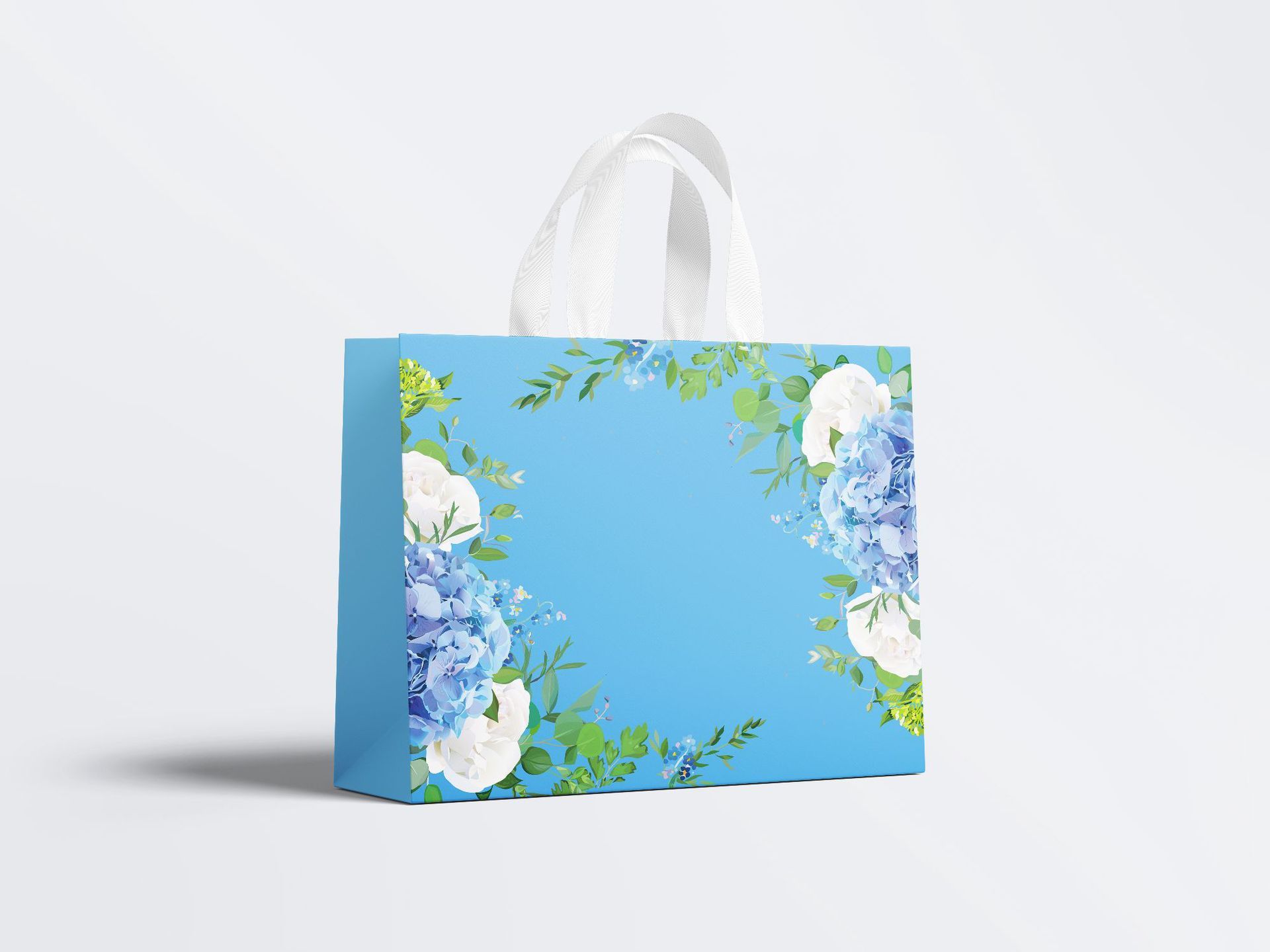 Wholesale custom kraft paper bags with floral patterns, suitable for crafts, embossed logos, and apparel packaging.