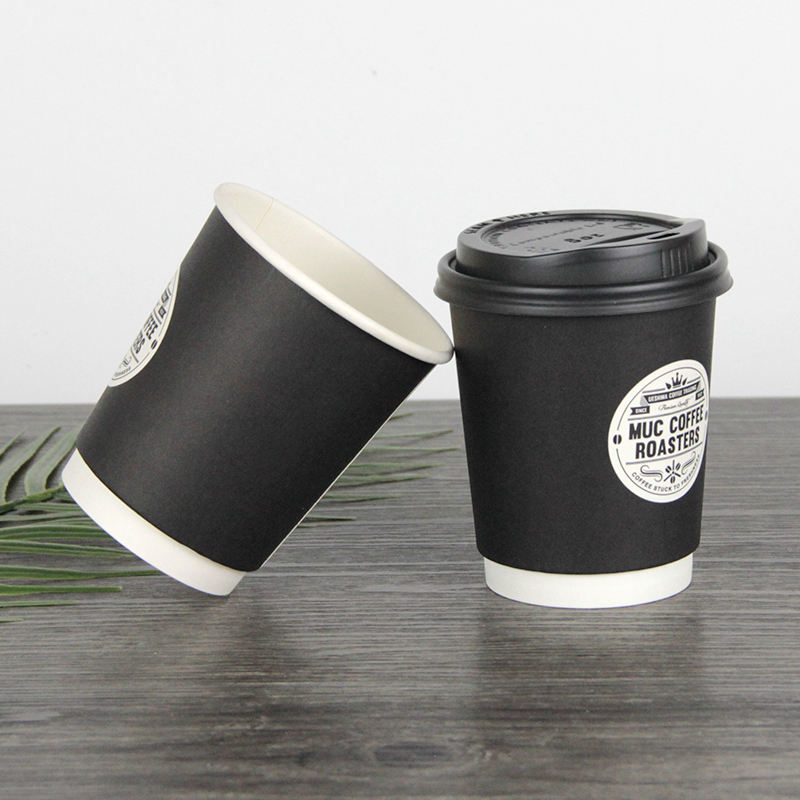 Double-wall, food-grade, thick disposable paper cups—custom printed with logos—suitable for hot drinks.