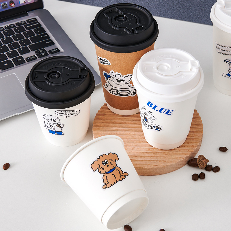 Custom-printed disposable double-wall paper cups for hot drinks—suitable for milk tea and coffee—with lids.